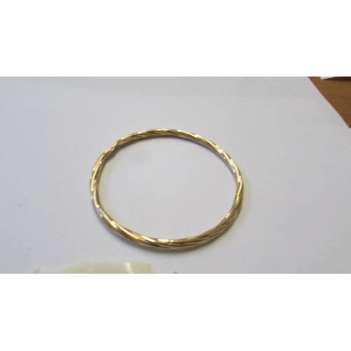 235 - Two 9ct gold bangles, 9 grams.