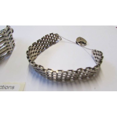 236 - Two silver hall marked gate bracelets, 42 grams.