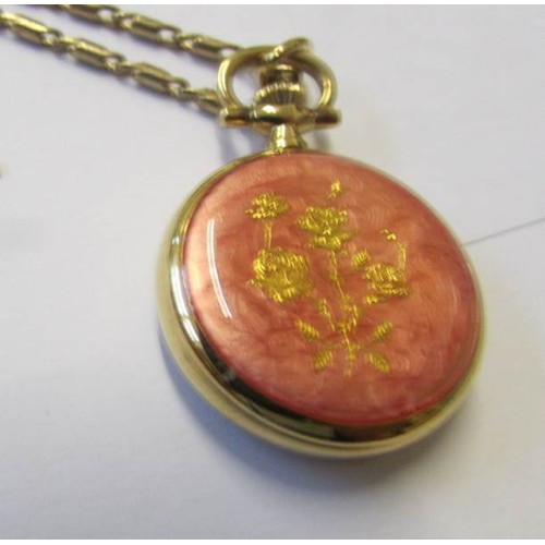 238 - A gilded pendant watch with enamel style back and front, Swiss made, Bernex.  In working order.