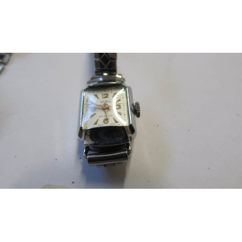 239 - A ladies Technos Incabloc Swiss made wrist watch and a Gent's Bentima wrist watch (plate damage to f... 