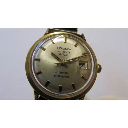 241 - A Sekonda Autodate deluxe 29 jewel shockproof gent's wrist watch.