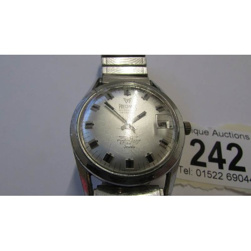 242 - A Precimax automatic incabloc precimaster 25 jewel wrist watch with metal strap, scratches to glass,... 