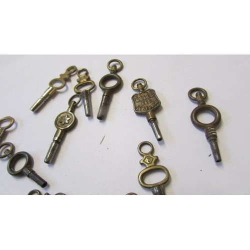 246 - Sixteen assorted pocket watch keys.