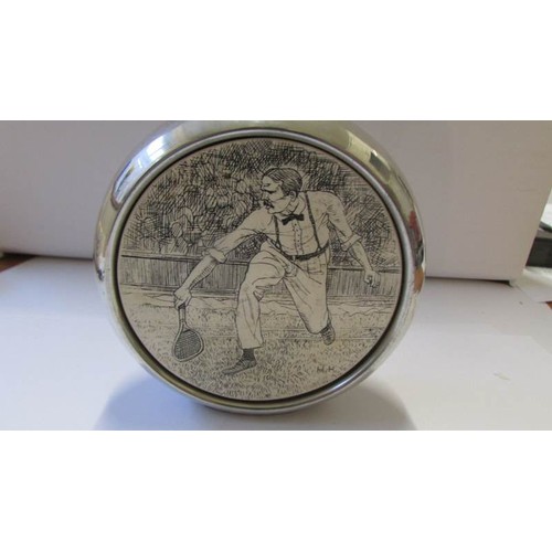 261 - A silver plate hip flask depicting a tennis player.