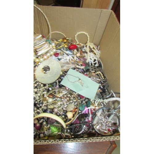 56 - A large box of costume jewellery.