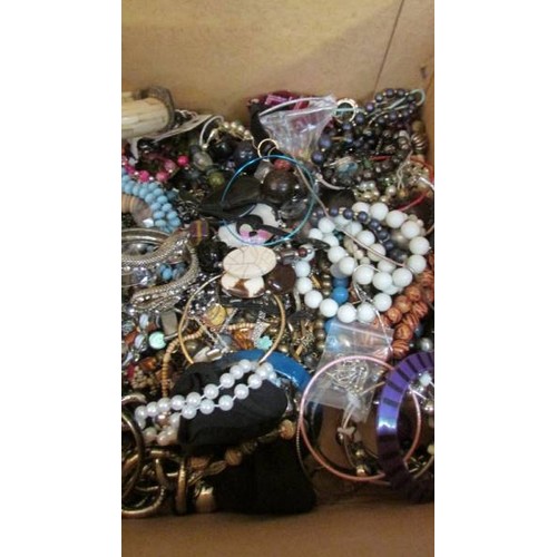 62 - A large box of costume jewellery.