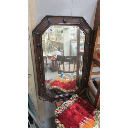 74 - An oak framed mirror, COLLECT ONLY.