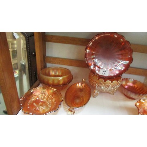 77 - A quantity of marigold carnival glass dishes, COLLECT ONLY.