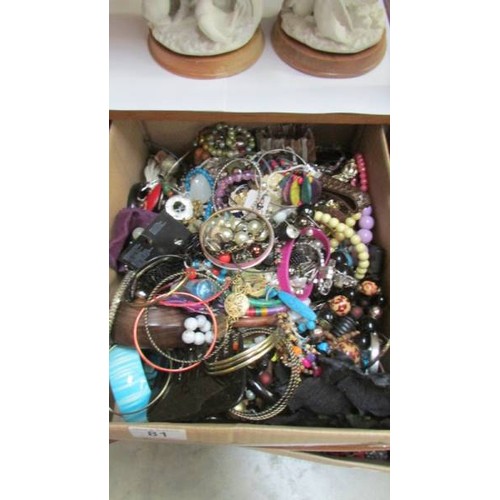 81 - A large box of costume jewellery.