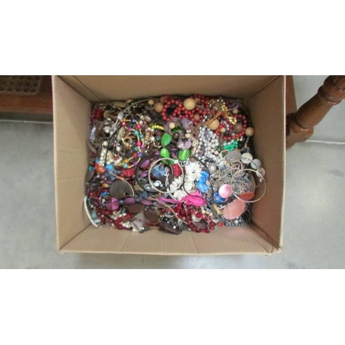 84 - A large box of costume jewellery.