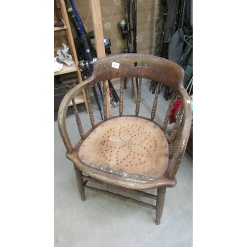 87 - An old smoker's bow chair. COLLECT ONLY.