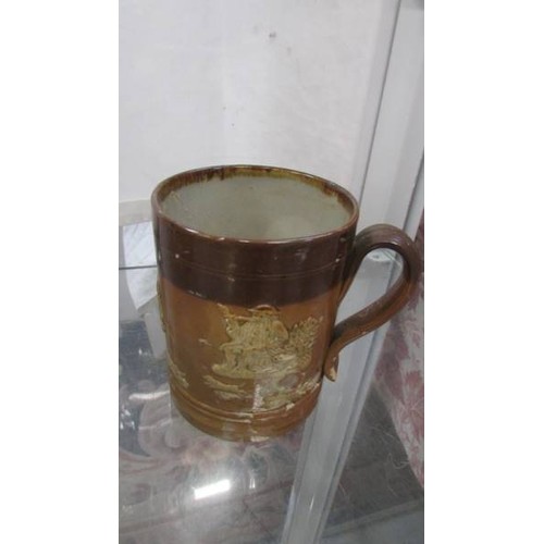 89 - A Doulton stoneware Harvest jug and mug.