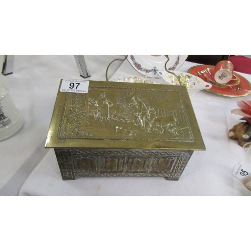 97 - An embossed brass box.