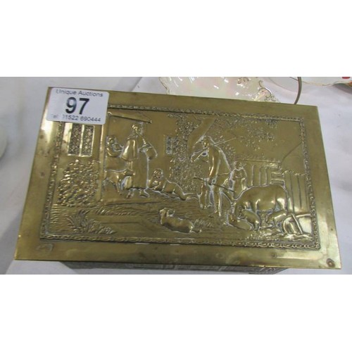 97 - An embossed brass box.