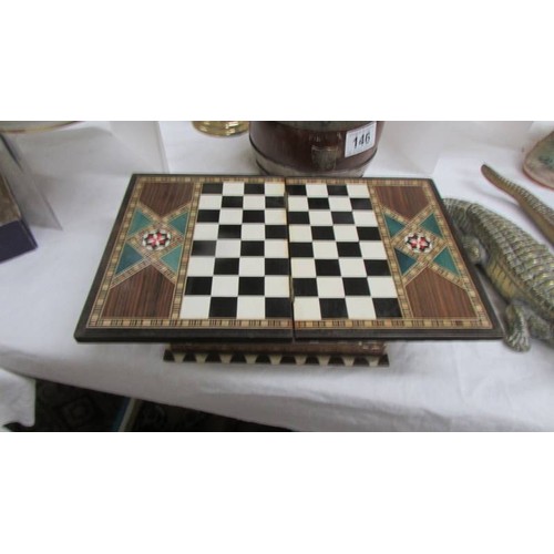 145 - An inlaid chess set.