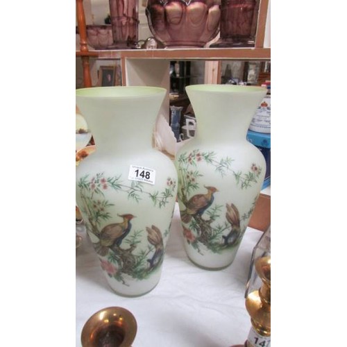 148 - A pair of glass vases decorated with pheasants. COLLECT ONLY.