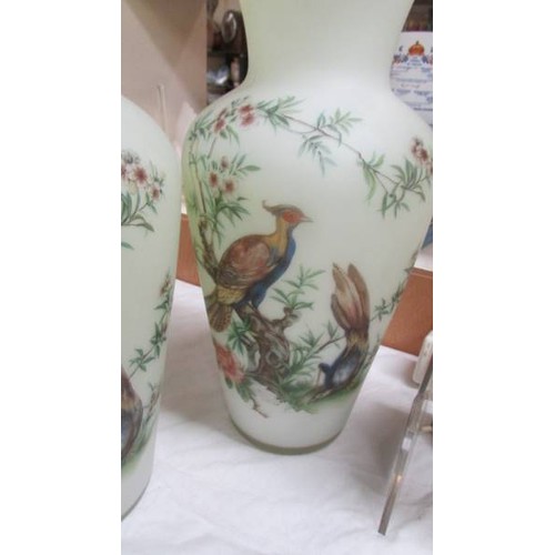 148 - A pair of glass vases decorated with pheasants. COLLECT ONLY.