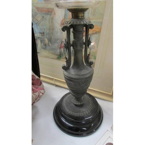 194 - A Victorian oil lamp base with glass font.