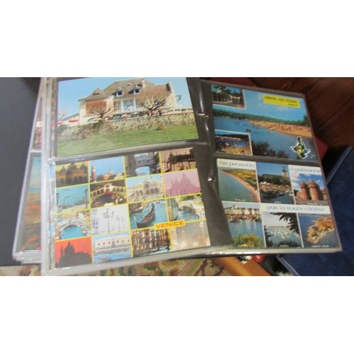 199 - Six albums of assorted post cards.