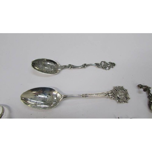 281 - Two silver spoons and a mixed lot of silver and white metal jewellery.