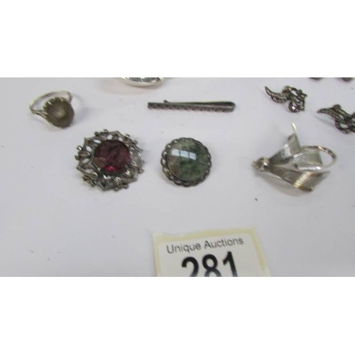 281 - Two silver spoons and a mixed lot of silver and white metal jewellery.