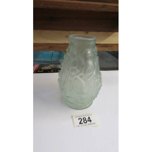 284 - A French Lalique style glass vase, 13 cm.