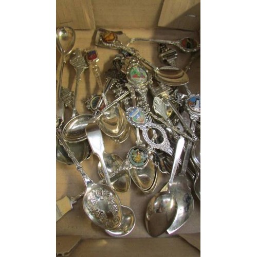 286 - A mixed lot of souvenir spoons etc.,