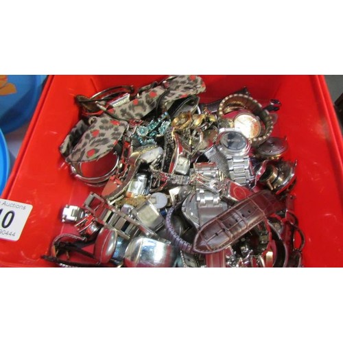 310 - Approximately 65 wrist watches and watch heads including Sekonda, DKNY etc.,