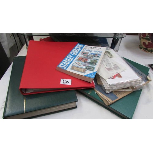 335 - A quantity of stamp albums and first day covers.