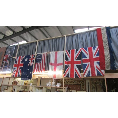 352 - A quantity of flags including Union Jack in various sizes.  COLLECT ONLY.