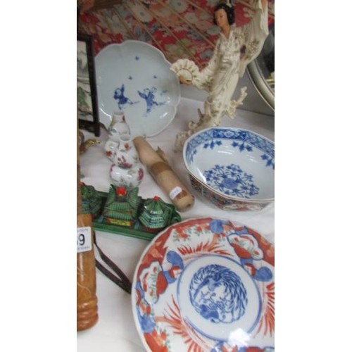 369 - A mixed lot of oriental items including ceramics, parasol etc., COLLECT ONLY.