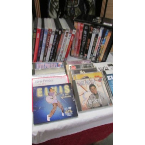 393 - A mixed lot of Elvis CD's and DVD's.