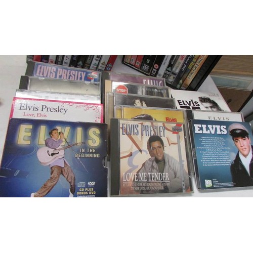 393 - A mixed lot of Elvis CD's and DVD's.