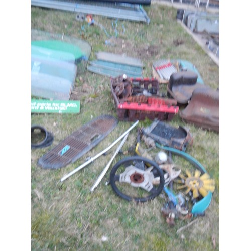 803 - A good lot of early and late Mini spares including uprated drive shafts with AP four pot calipers/di... 