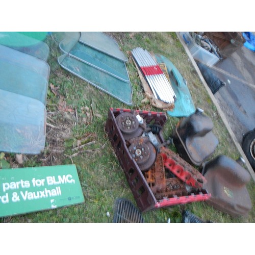 803 - A good lot of early and late Mini spares including uprated drive shafts with AP four pot calipers/di... 