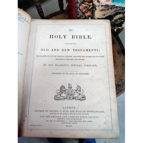 63 - Three old Bibles.