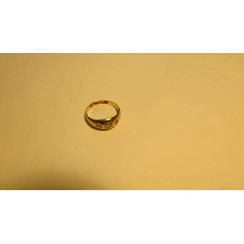 2020 - An 18ct gold three stone diamond ring, size S, 5.8 grams.