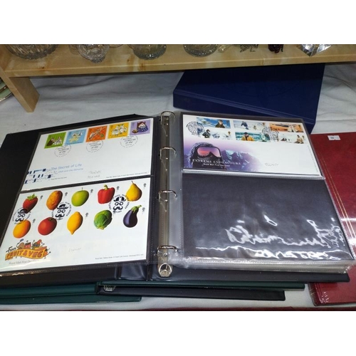 13 - 5 stamp albums, 2 general collection, 2 x Royal Mail first day cover albums (approximately 90 covers... 