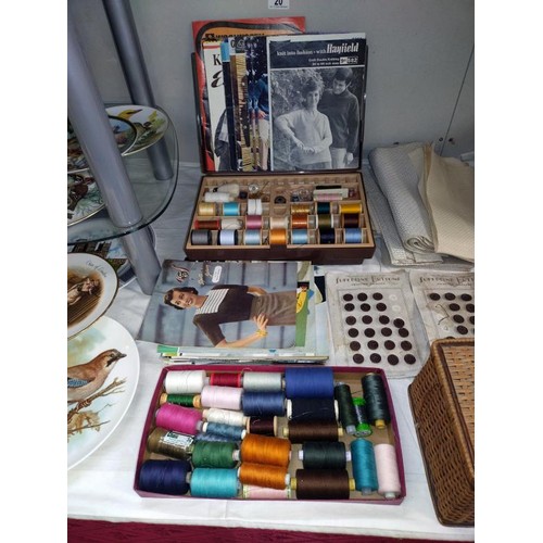 20 - A quantity of haberdashery including threads, sewing boxes, buttons & vintage needle packages