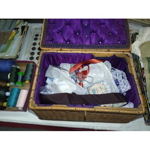 20 - A quantity of haberdashery including threads, sewing boxes, buttons & vintage needle packages