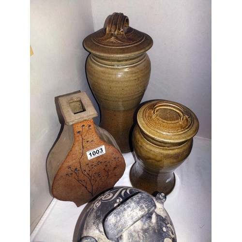 1003 - 5 pieces of Studio pottery including lidded storage jars & vase etc. COLLECT ONLY.