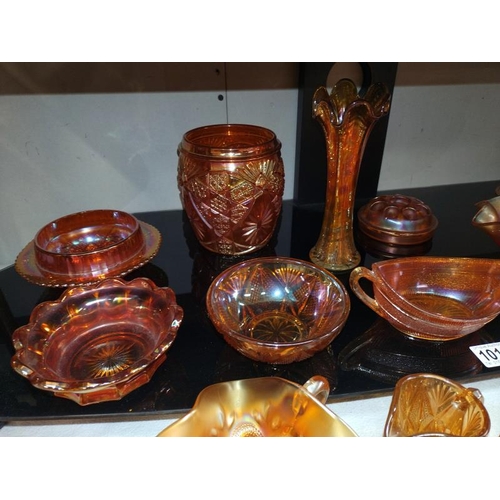 1016 - A large quantity of amber carnival glass, COLLECT ONLY.