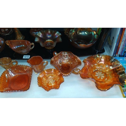 1016 - A large quantity of amber carnival glass, COLLECT ONLY.