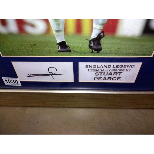 1030 - A framed Stuart Pearce/England shirt, signed. COLLECT ONLY.