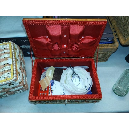 1035 - A box & wicker basket of linen & material & 2 sewing baskets & contents