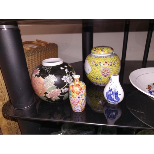 1039 - A quantity of Chinese pottery & perfume bottles etc.