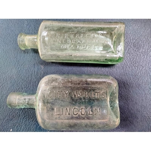 1050 - A quantity of vintage bottles including stoneware Lincoln ginger beer bottles. COLLECT ONLY.