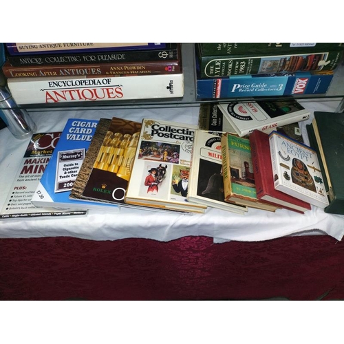 35 - A good collection of antique reference books including medals & Rolex Oyster catalogues