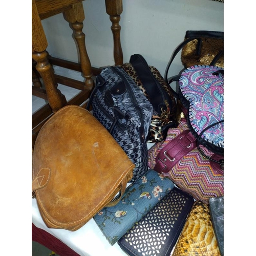 37 - A good selection of handbags