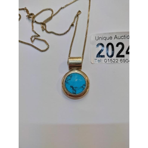 2024 - A Mexican turquoise set pendant in silver, stamped